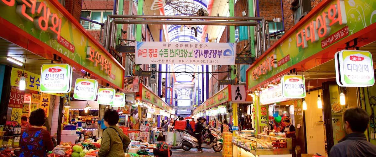 Gukje Market which includes markets, signage and food