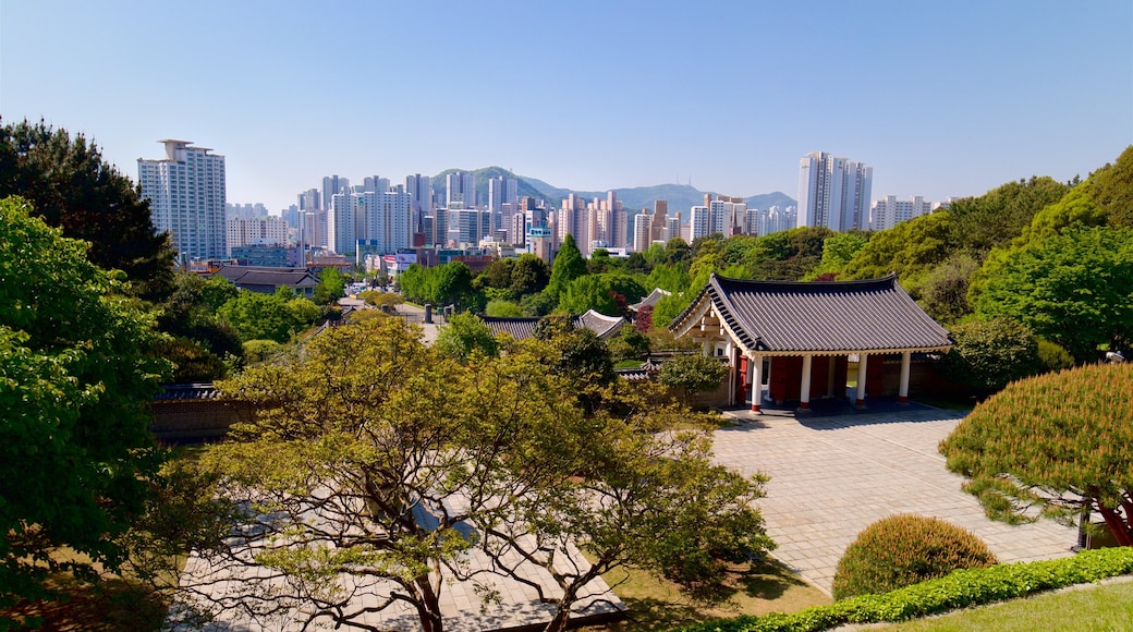 Chungnyeolsa which includes a high-rise building, landscape views and a city