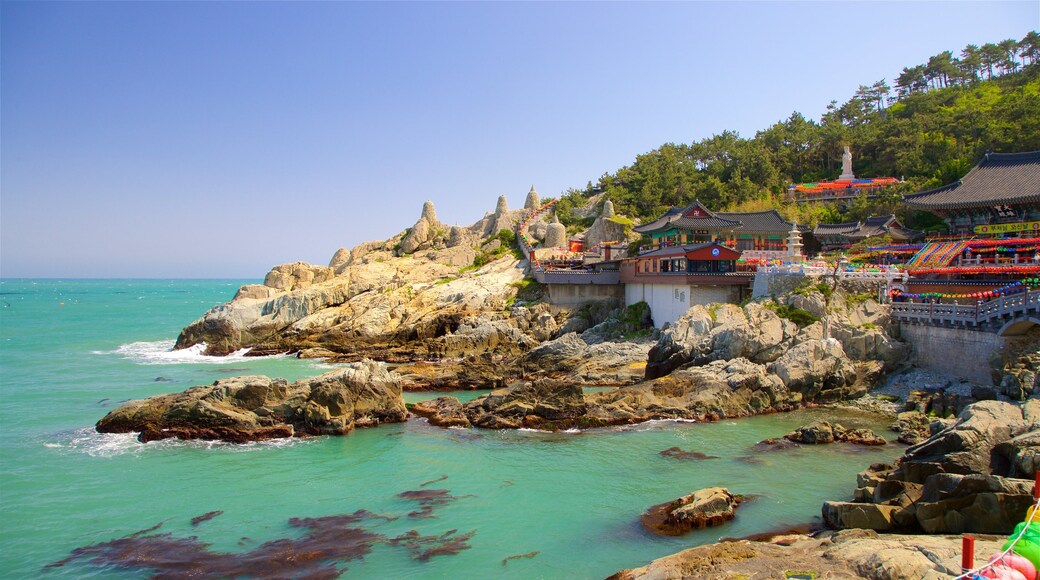 Haedong Yonggung Temple featuring general coastal views and rocky coastline