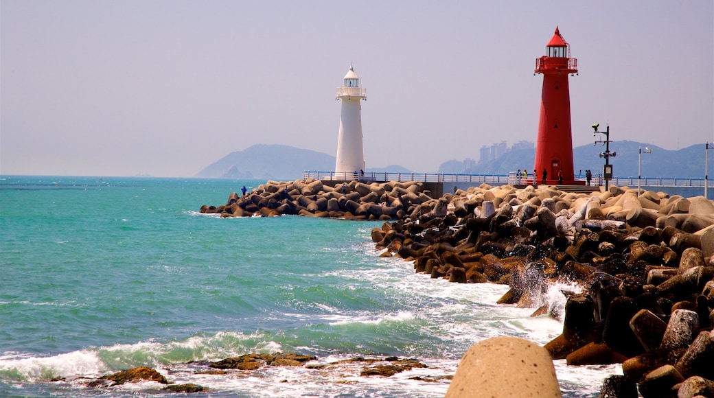 Busan featuring rocky coastline, general coastal views and a lighthouse