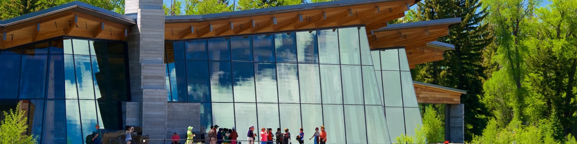 Jenny Lake Visitor Center which includes modern architecture as well as a small group of people