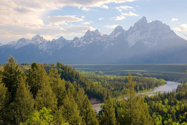 Moran showing mountains, a sunset and tranquil scenes