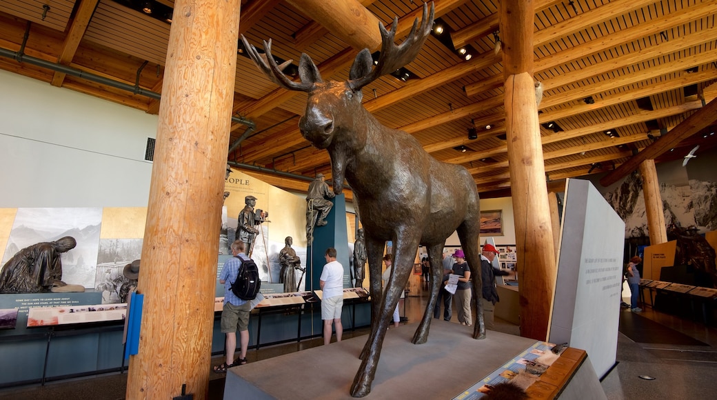 Jenny Lake Visitor Center featuring interior views as well as a small group of people