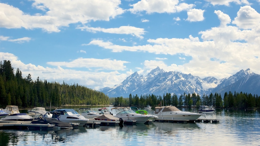 Colter Bay Visitor Center showing a river or creek and mountains
