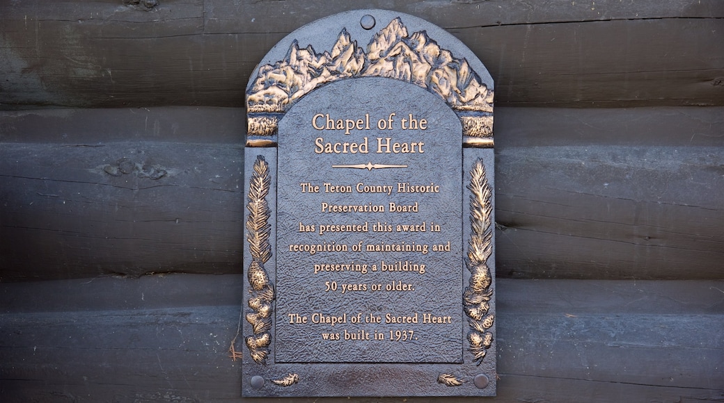 Chapel of the Sacred Heart featuring signage and heritage elements