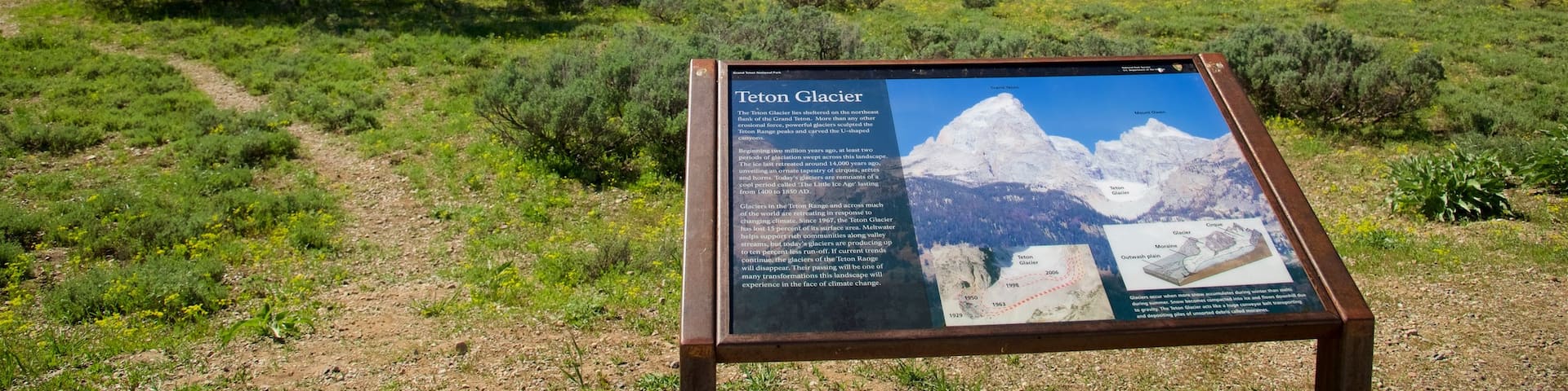 Teton Glacier Turnout featuring mountains, landscape views and signage