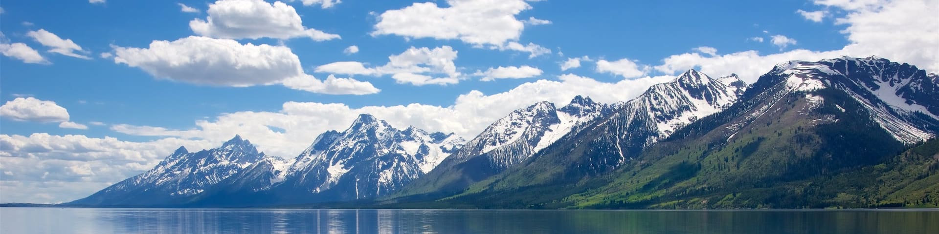 Jackson Lake showing mountains and a lake or waterhole