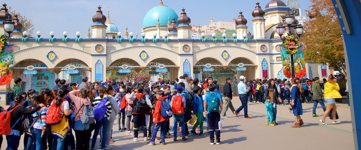 Everland featuring heritage elements and a square or plaza as well as a large group of people