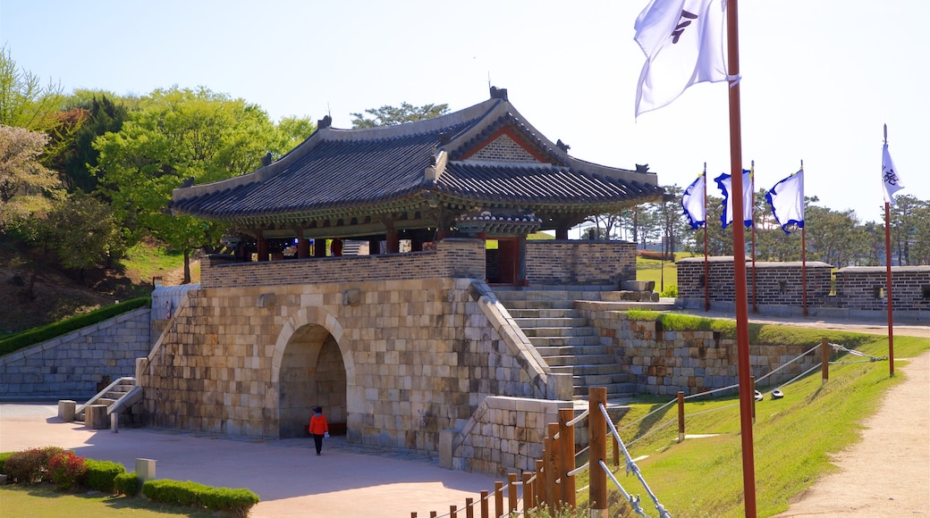 Hwaseomun Gate which includes a garden and heritage architecture