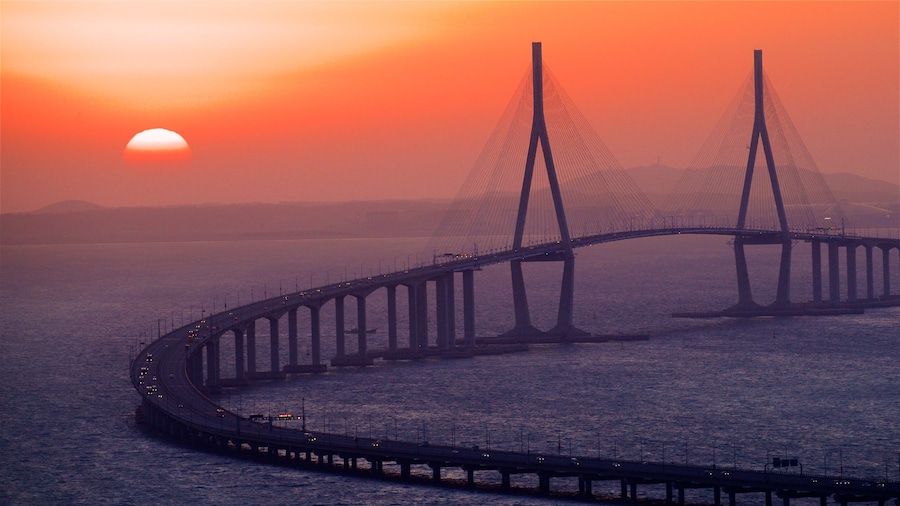 Incheon Bridge featuring a sunset, a bridge and landscape views