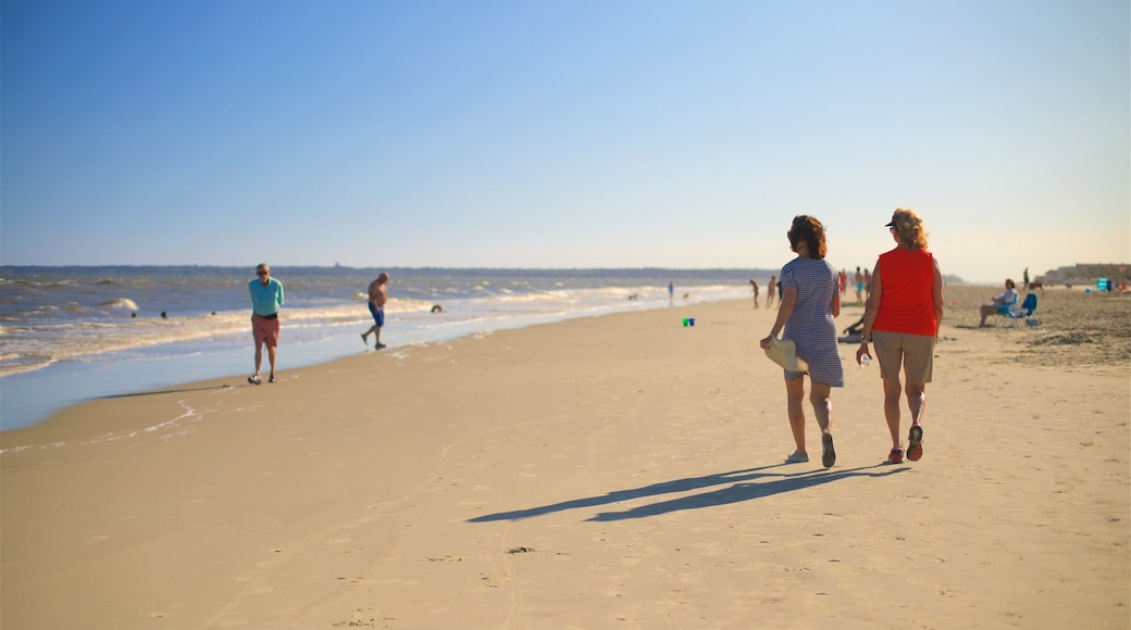 St. Simons Island showing a beach, a sunset and general coastal views