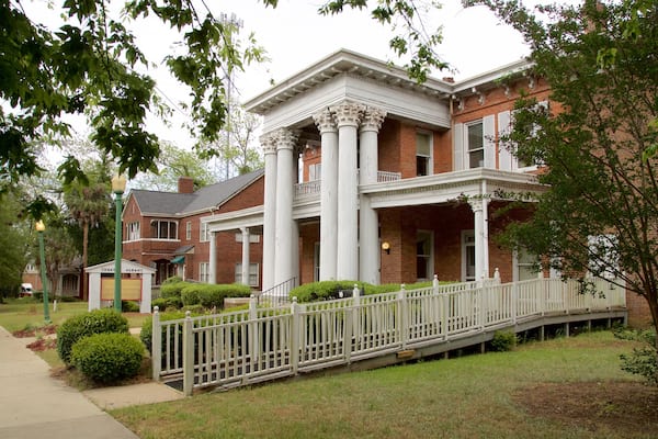 Theater Albany featuring heritage elements and a house