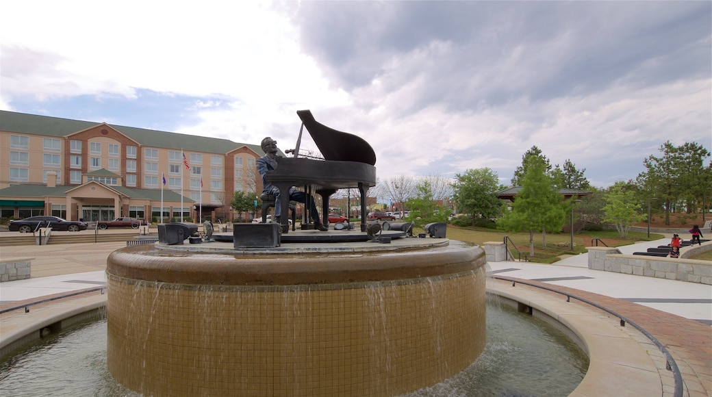 Ray Charles Plaza showing a fountain and a statue or sculpture