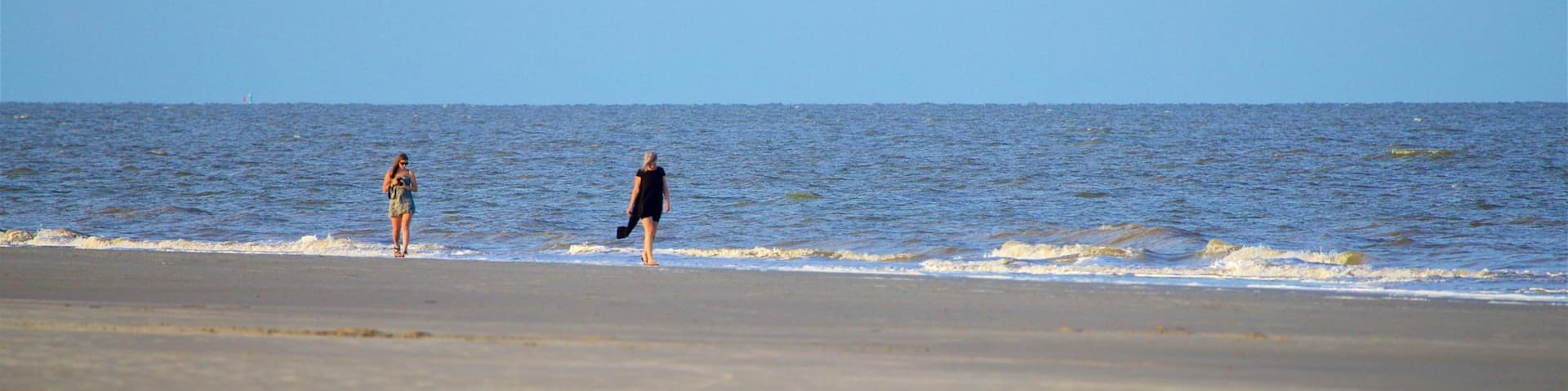 Great Dunes Park featuring general coastal views and a sandy beach as well as a couple