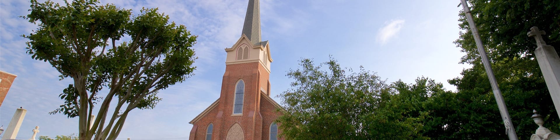 Lewes featuring a church or cathedral, a sunset and a cemetery