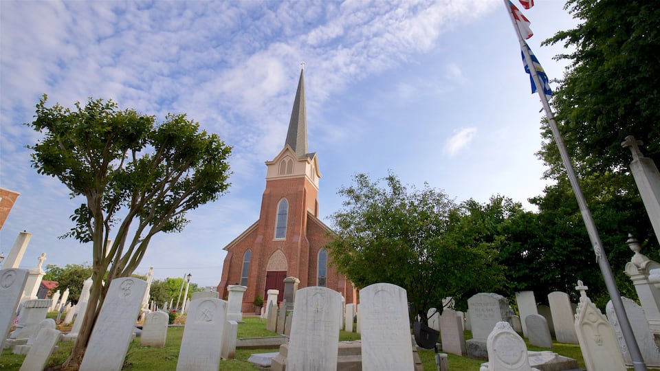 Lewes which includes a church or cathedral, a sunset and a cemetery