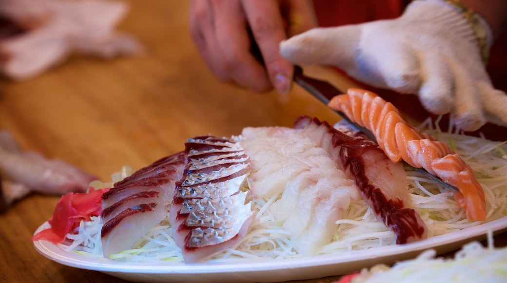 Noryangjin Fish Market which includes interior views and food