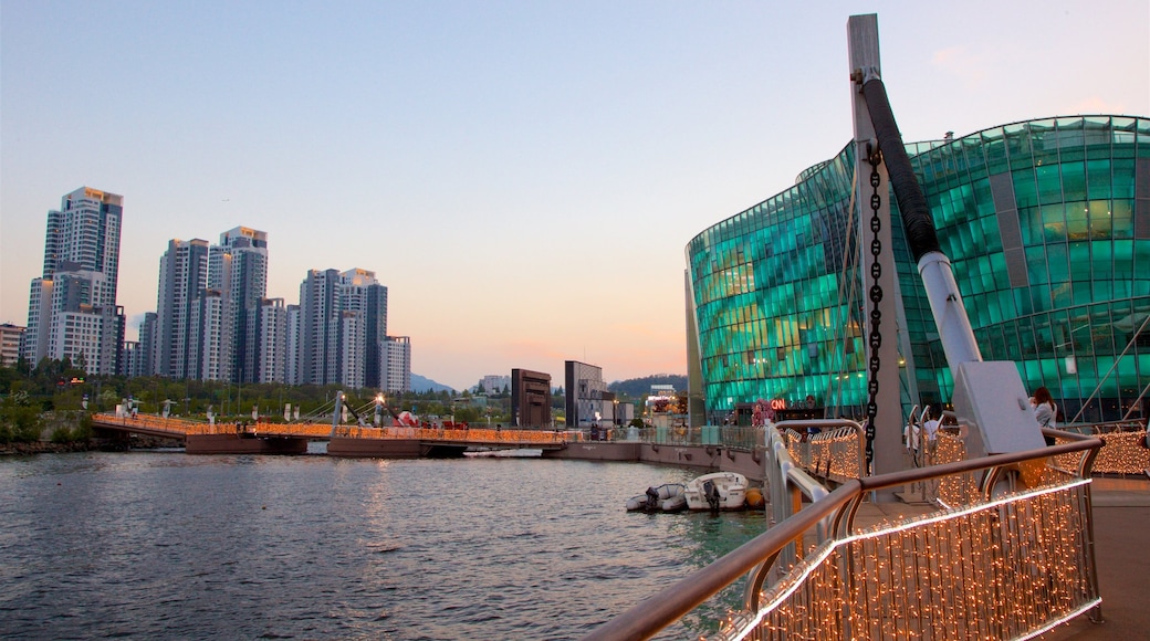 Seocho-gu which includes a sunset, a high-rise building and modern architecture