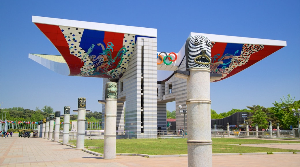 Parque Olímpico mostrando arte al aire libre y un jardín