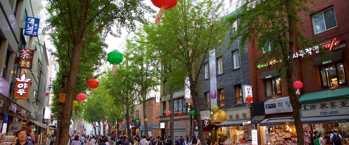 Insadong which includes shopping as well as a small group of people