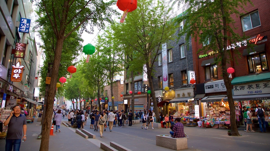 Insadong which includes shopping as well as a small group of people