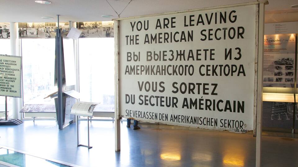 Checkpoint Charlie Museum which includes signage and interior views