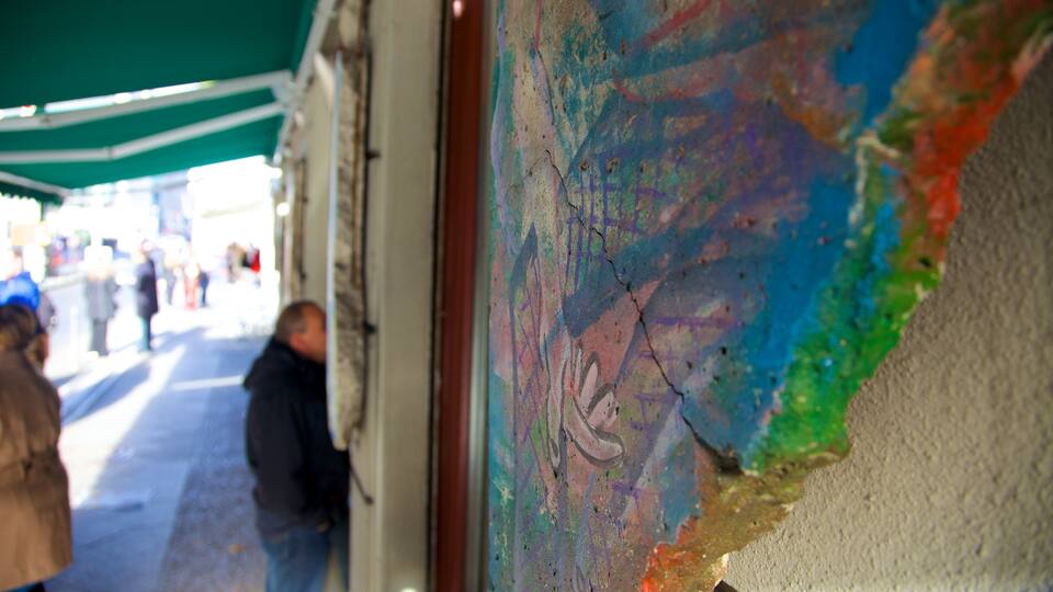 Checkpoint Charlie Museum as well as an individual male