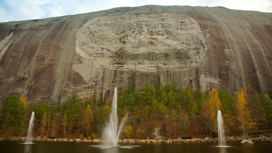 Atlanta showing a fountain, outdoor art and mountains