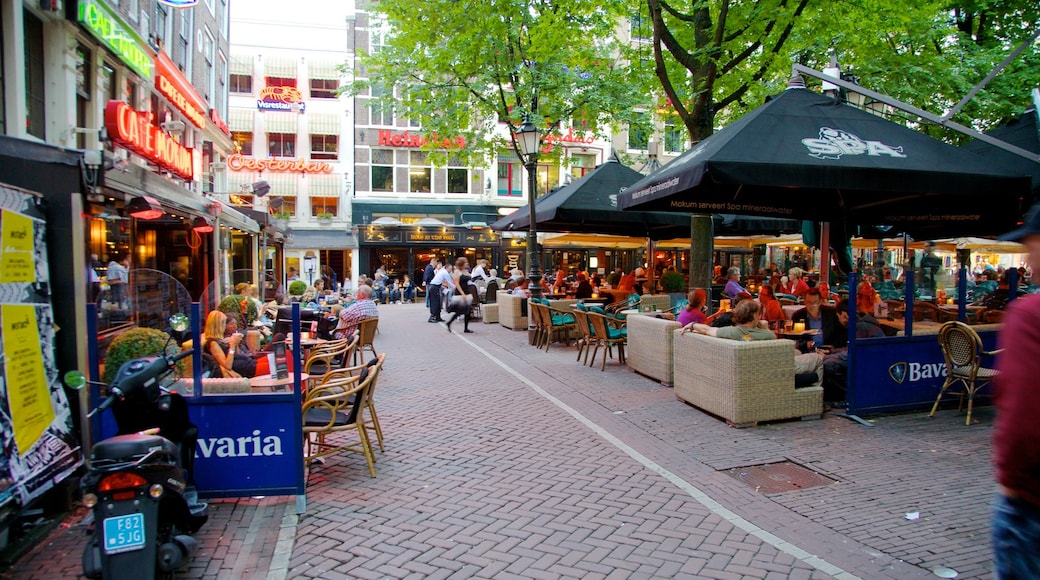 Leidseplein showing dining out, street scenes and a city