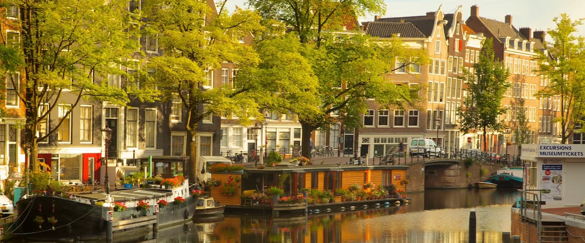 Amsterdam showing a city, a river or creek and boating