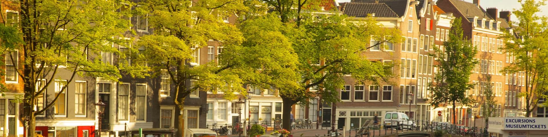Amsterdam which includes a river or creek, boating and a city