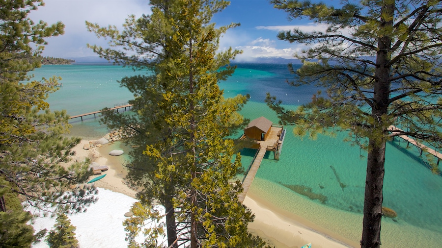 Lake Tahoe showing a beach and landscape views