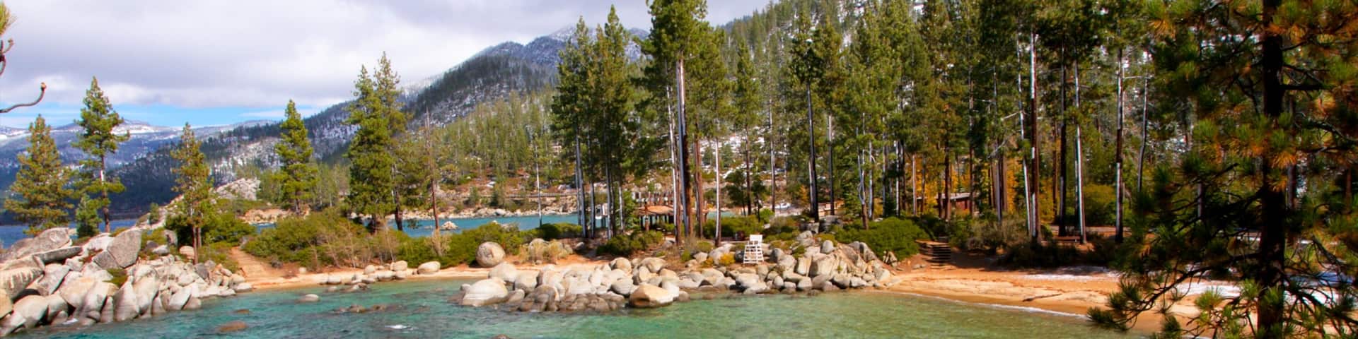 Sand Harbor of Lake Tahoe Nevada State Park featuring forest scenes, mountains and landscape views