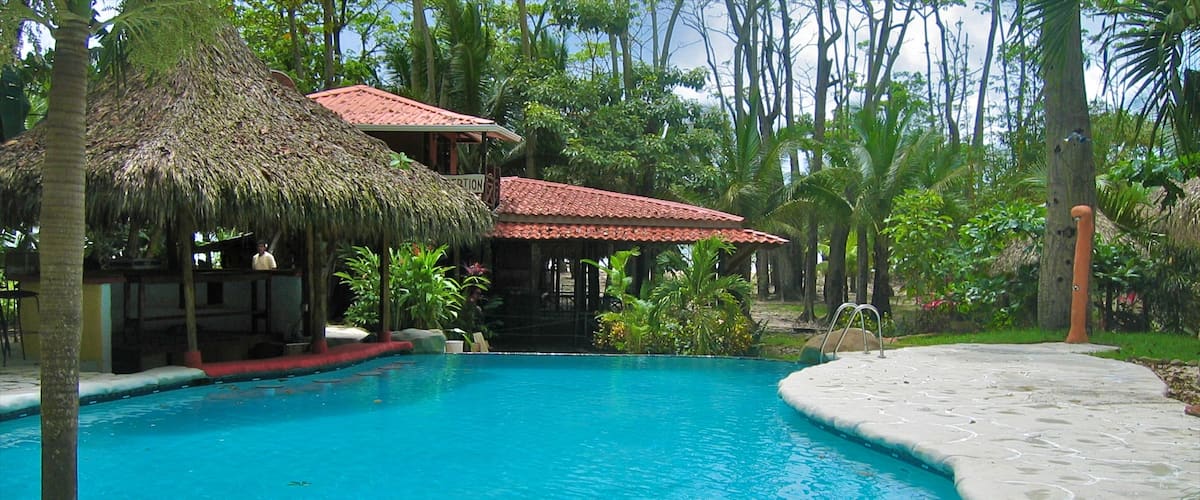 Costa Rica which includes a pool and tropical scenes