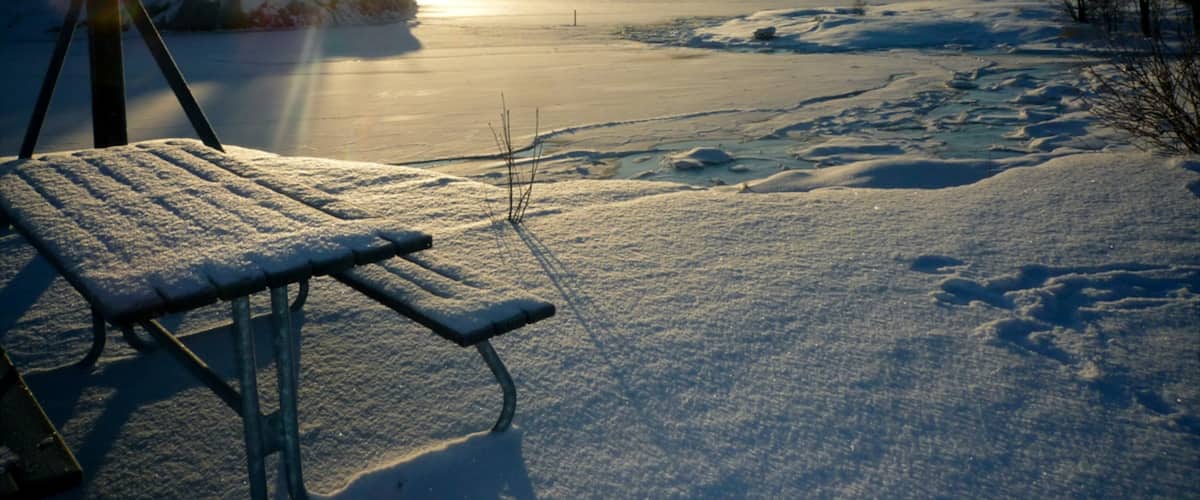 Helsinki showing a sunset and snow