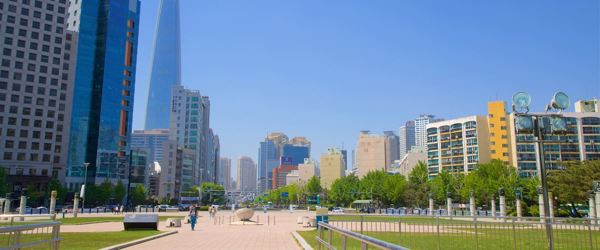 Olympic Park showing landscape views, a garden and a city