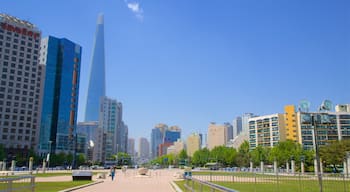 Olympic Park showing a city, a high-rise building and landscape views