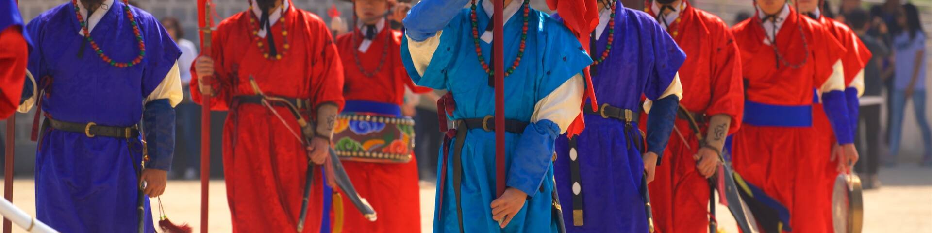 Gyeongbok Palace which includes performance art as well as a small group of people