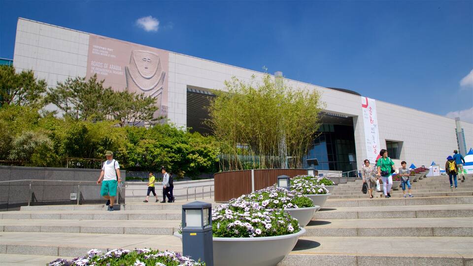 National Museum of Korea showing flowers as well as a small group of people