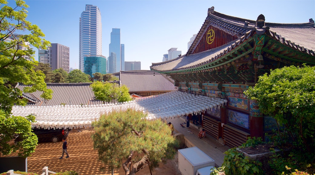 Bongeunsa Temple featuring a high rise building, a city and heritage architecture