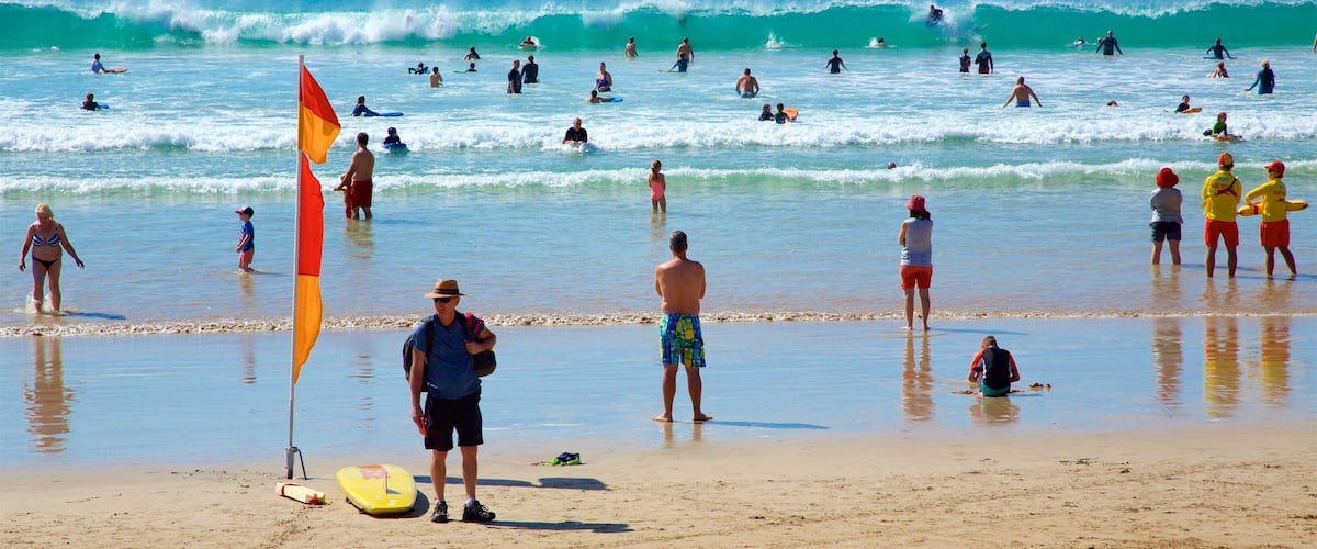 Great Ocean Road which includes a sandy beach, general coastal views and waves