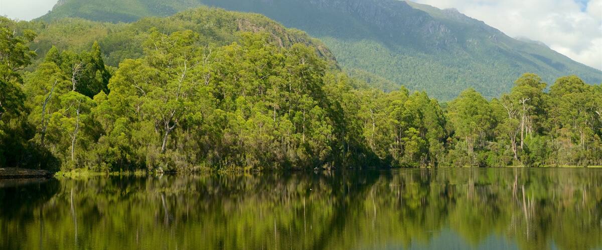 Midlands featuring a lake or waterhole, mountains and tranquil scenes