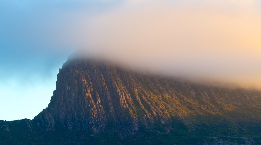 Midlands which includes mountains, mist or fog and a sunset