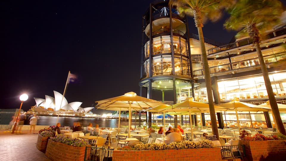 Circular Quay - The Rocks showing a bay or harbor, outdoor eating and modern architecture