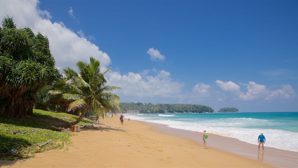 Plage de Karon mettant en vedette vues littorales, plage de sable et scĂšnes tropicales