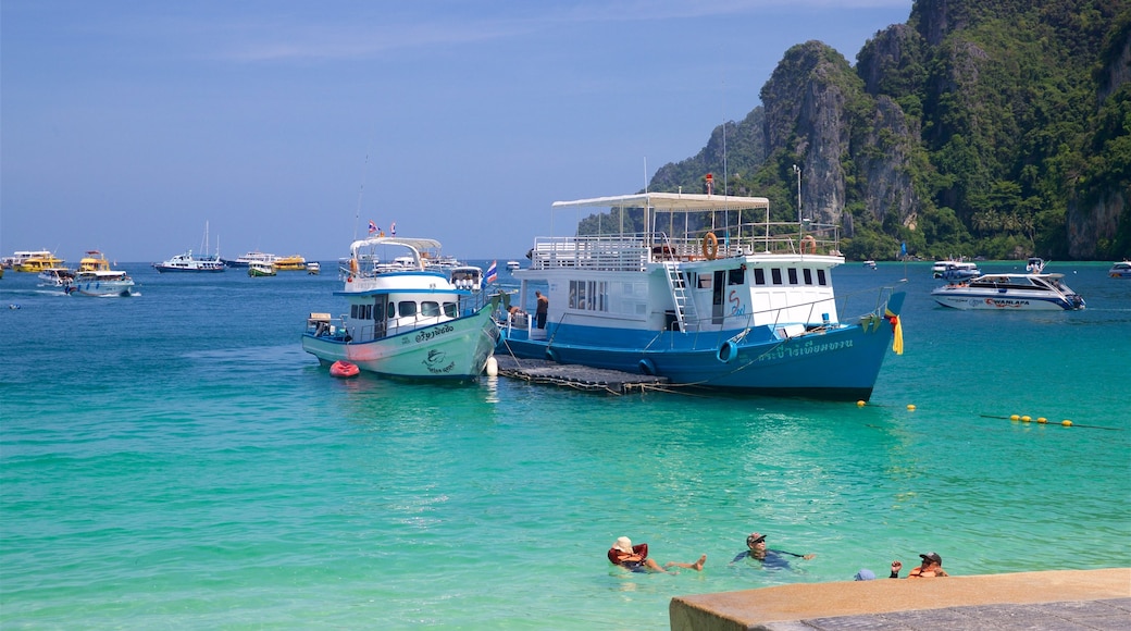 Ko Phi Phi featuring tropical scenes, swimming and a bay or harbour