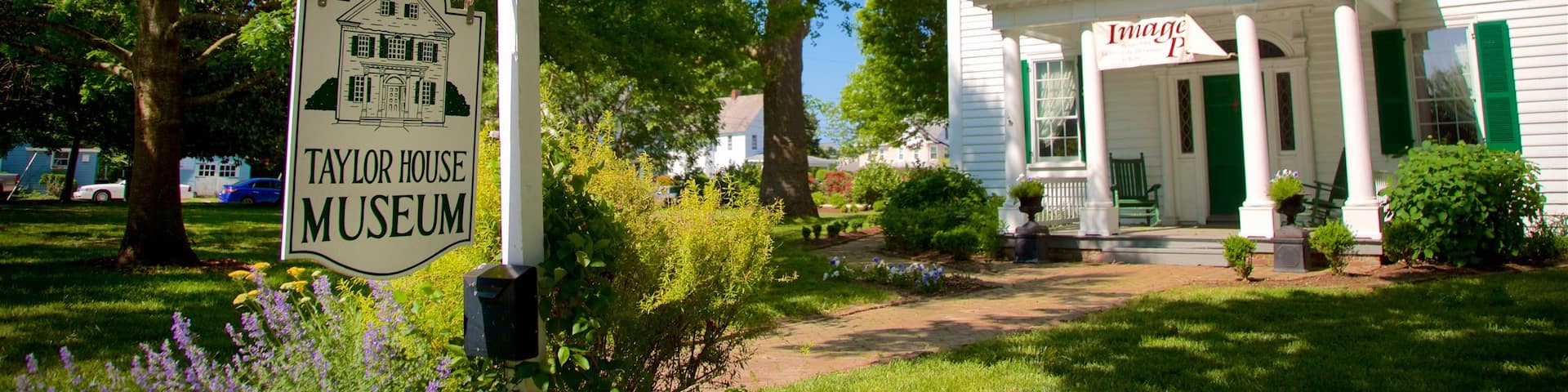 Calvin B. Taylor House Museum showing signage and a house