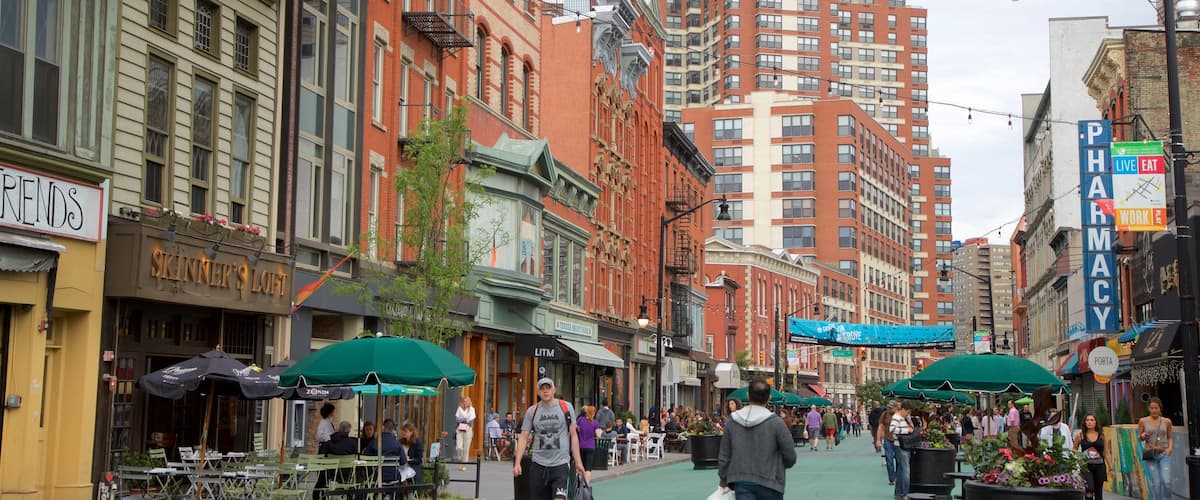 Downtown Jersey City showing a city as well as a small group of people