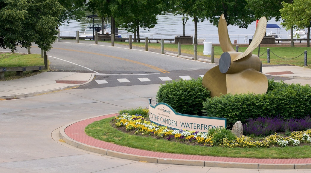 Camden showing outdoor art, a garden and flowers