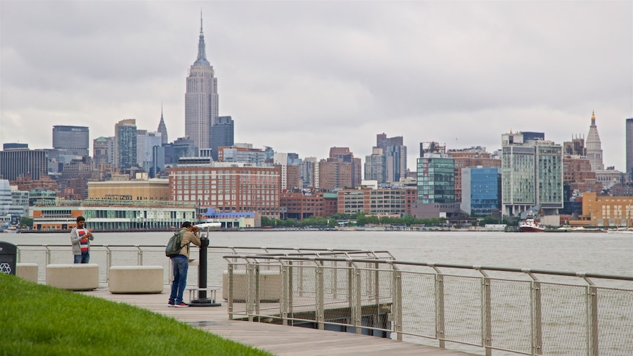 Pier A Park which includes a high-rise building, a river or creek and a city